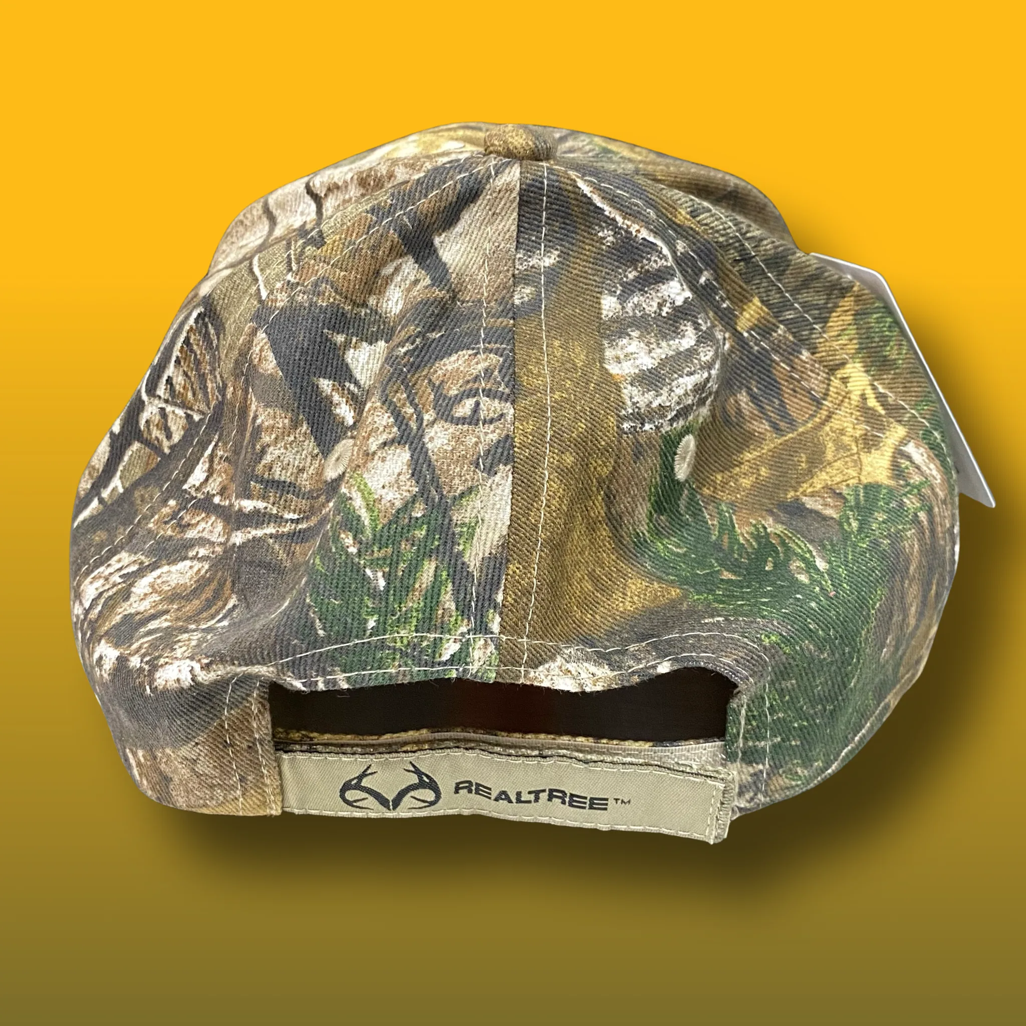 Baked In Bushwick Real Tree Camo Cap – brown camouflage dad hat with white embroidered logo and adjustable strapback.