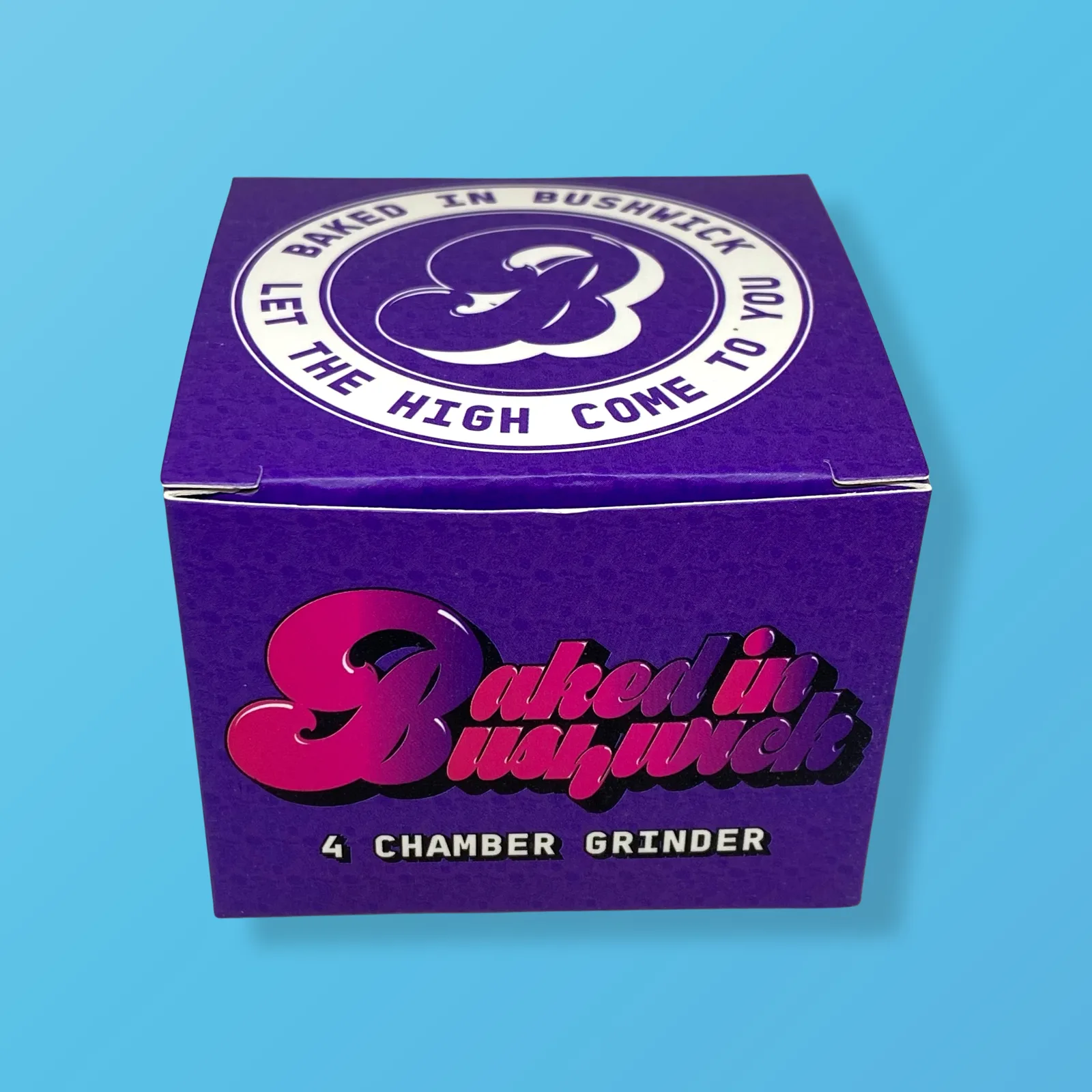 Baked in Bushwick Purple Aluminum Grinder – 63mm 4-piece with Keif Catcher and mesh screen compartment.