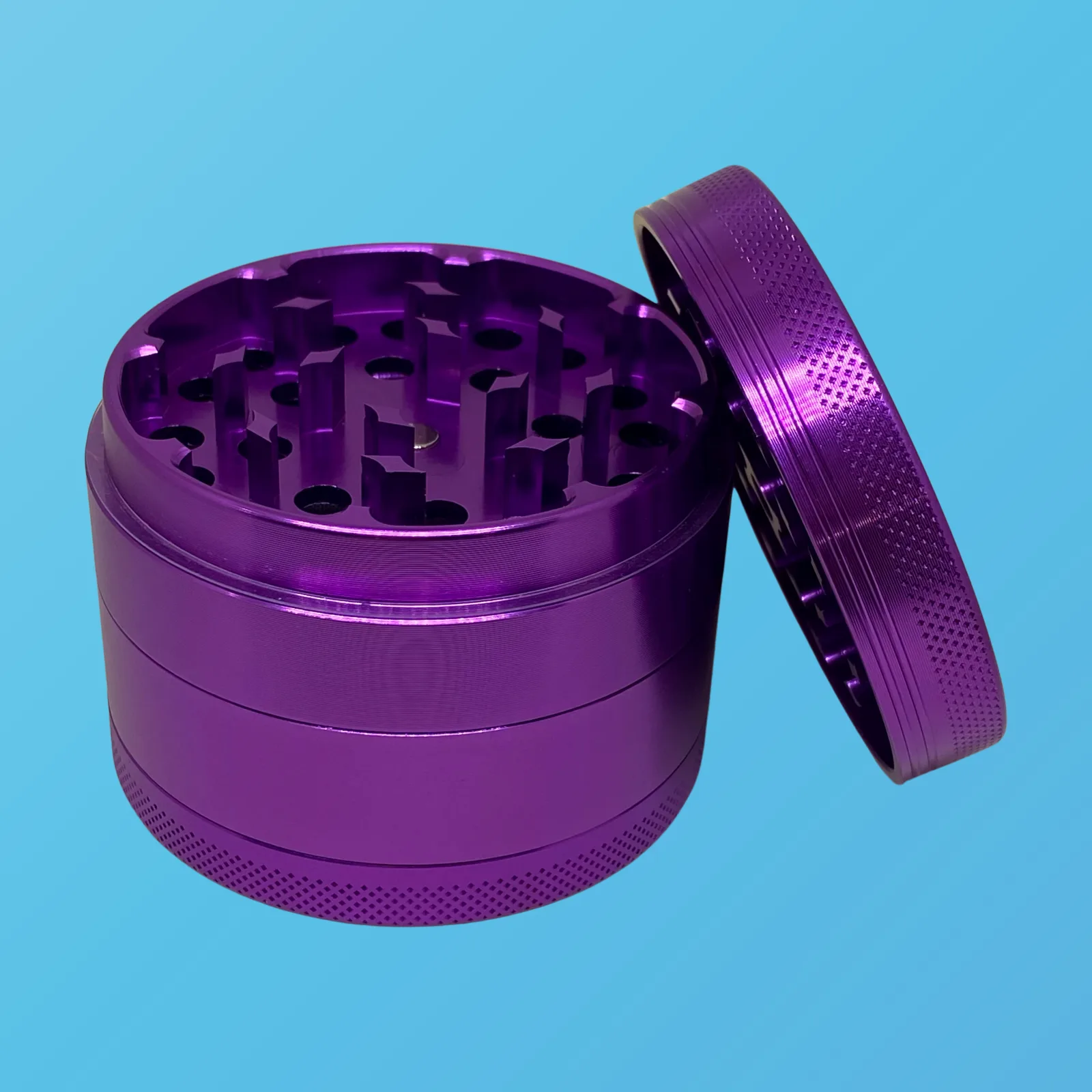 Baked in Bushwick Purple Aluminum Grinder – 63mm 4-piece with Keif Catcher and mesh screen compartment.