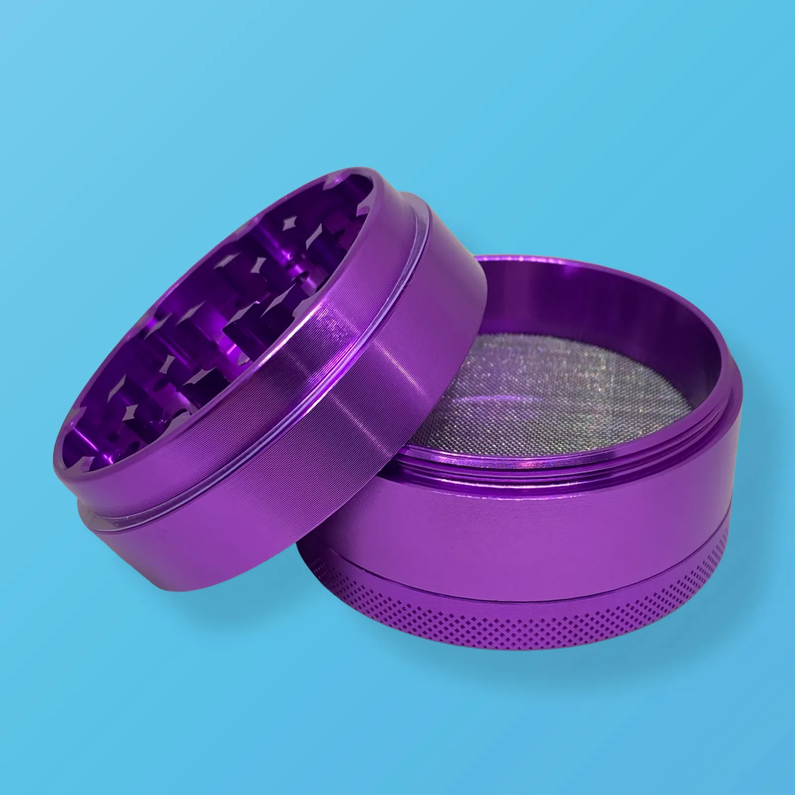 Baked in Bushwick Purple Aluminum Grinder – 63mm 4-piece with Keif Catcher and mesh screen compartment.
