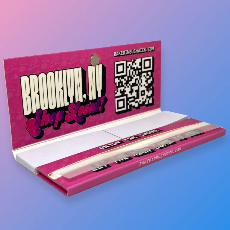Baked in Bushwick Pink Magnetic Clasp Rolling Paper Booklets – King size papers with perforated tips and magnetic clasp.
