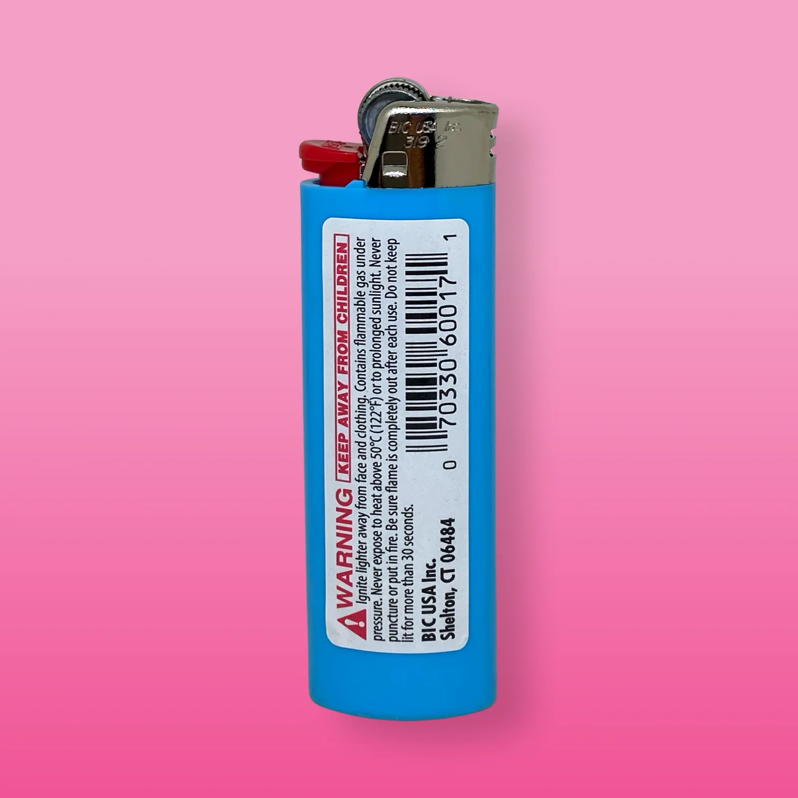 Blue Baked in Bushwick-branded lighter with bold white logo design on compact refillable torch